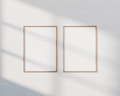 2 Vertical 5x7 White Wall Frames Mockup With Sunlight